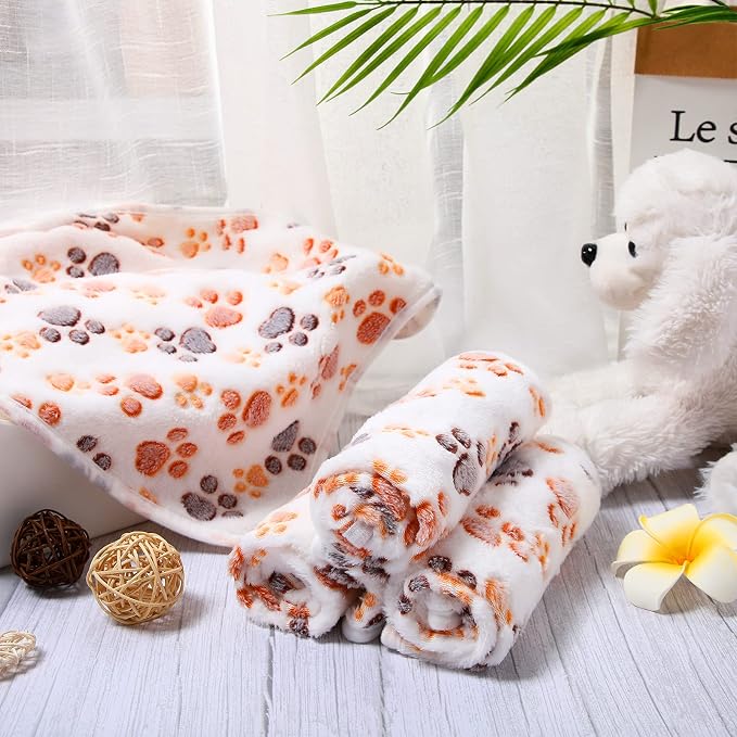 Tatuo 4 Pack Fleece Dog Blankets for Puppy Cats Multi-Size Sleep Mat for Pet Guinea Pig Soft Washable Warm Crate Bed Puppy Teething Toys Print Pattern Blanket Indoor(White,41 x 30 Inch,Paw)