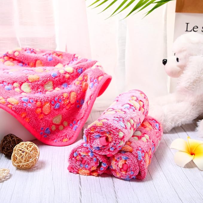 Tatuo 4 Pack Fleece Dog Blankets for Puppy Cats Multi-Size Sleep Mat for Pet Guinea Pig Soft Washable Warm Crate Bed Puppy Teething Toys Print Pattern Blanket Indoor(Pink,24 x 16 Inch,Paw)